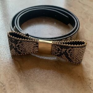 Black and white snakeskin belt | studded bow detail